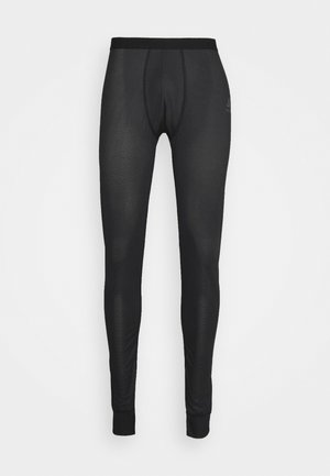 Schwarze thermische Leggings verfügen über einen strukturierten Stoff, einen elastischen Bund und eine taillierte Passform. Die Beine verjüngen sich am Saum für eine enganliegende Passform.
