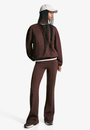 FLARED - Pantaloni de trening - dark brown