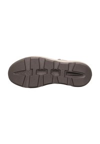 Schuhsohle aus strukturiertem Gummi-Material, mit tiefen Rillen und hexagonalen Mustern für Grip, in dunkelgrauer Farbe.