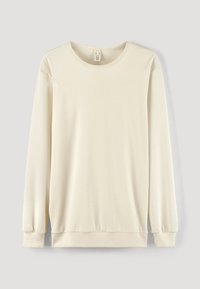 Långärmad gräddfärgad sweatshirt i mjukt tyg, med rund halsringning och åtsittande mudd. Slät textur med en minimalistisk design.