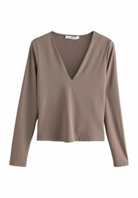 Langslavige V-hals top in taupe kleur, gemaakt van gladde stof. Heeft een relaxte pasvorm en een gestikte zoom, zonder zichtbare hardware of patronen.