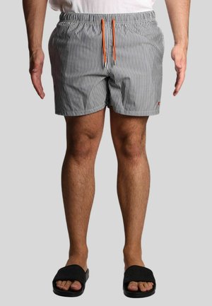 Costumi da bagno a righe realizzati in tessuto leggero, con un motivo a strisce orizzontali in blu navy e bianco, e un cordino arancione.