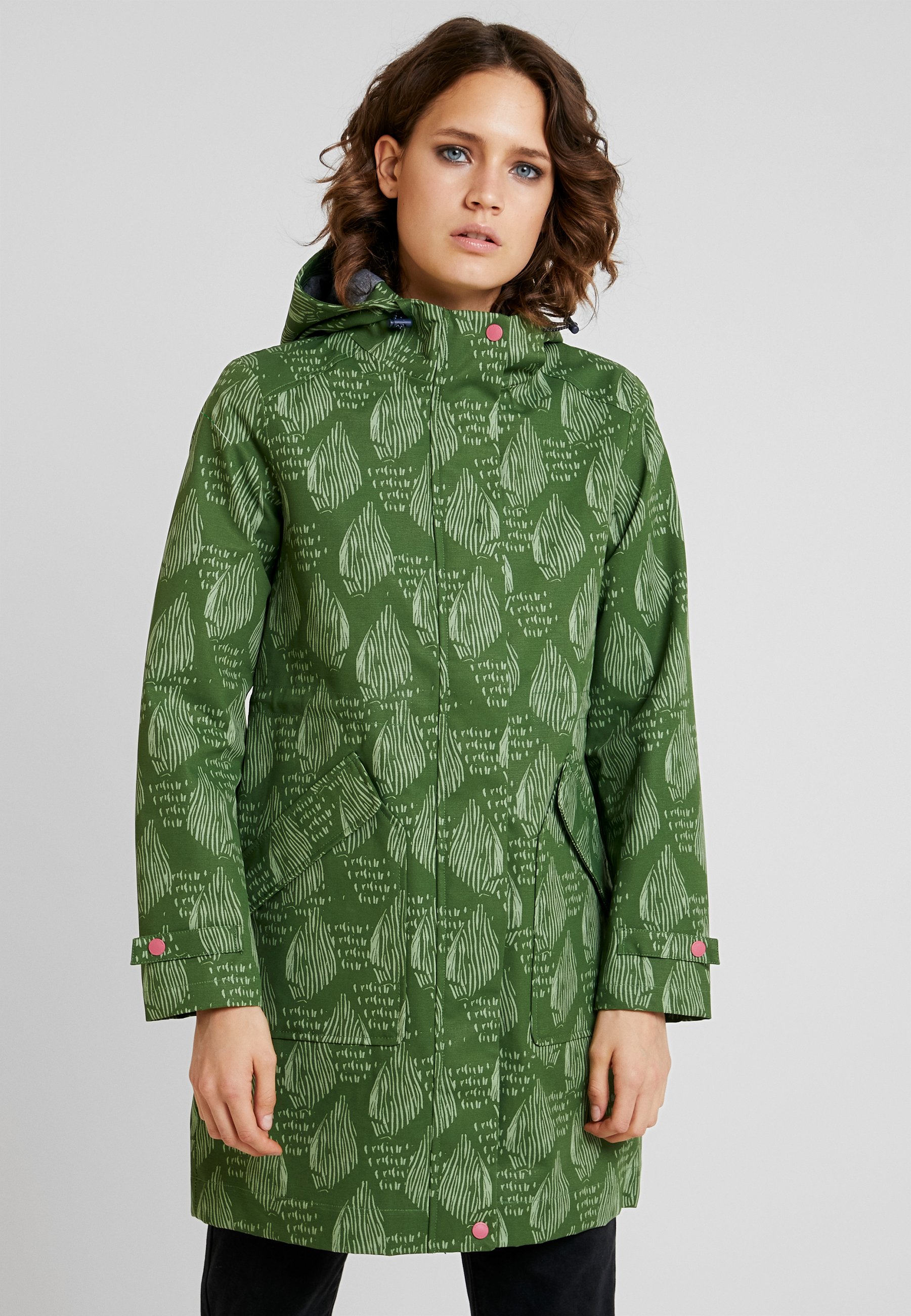 white stuff green coat