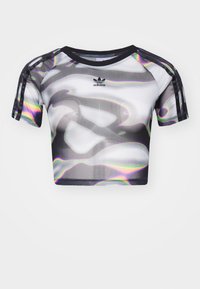 Cropped athletic shirt featuring a black and white wavy pattern with iridescent accents, made of breathable mesh fabric, with short sleeves.