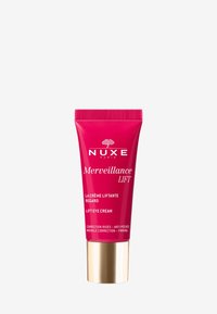 Crema para los ojos NUXE Merveillance Lift en un tubo rosa brillante con acentos dorados. Incluye texto que destaca beneficios como la corrección de arrugas y el efecto reafirmante.