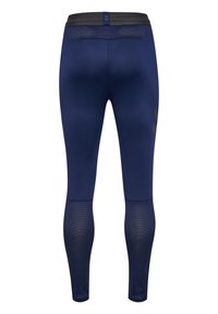 Leggings deportivos en azul marino con un acabado suave, que presentan una cinturilla elástica negra y paneles de malla en las pantorrillas para una mayor transpirabilidad.