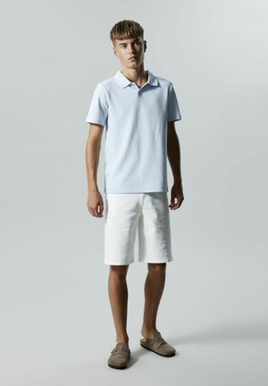 - Koszulka polo