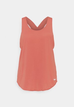 Koralowy bezrękawnik sportowy z krzyżującymi się paskami na plecach i małym białym logo Nike w dolnej prawej części przodu.