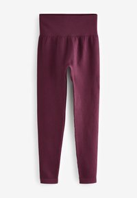Bordeauxrote gerippte Leggings mit einem breiten elastischen Bund. Der Stoff zeigt vertikale Linien, die eine strukturierte Optik verleihen.