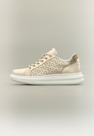 Beige sneakers with logo pattern, smooth leather and textile upper, padded collar, and a thick white rubber sole. Laces and gold accents visible.