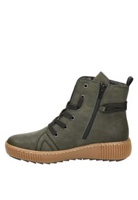 Bottine basse vert olive avec lacets noirs, fermeture éclair latérale, semelle en caoutchouc marron texturée et col matelassé avec languette à l'arrière.