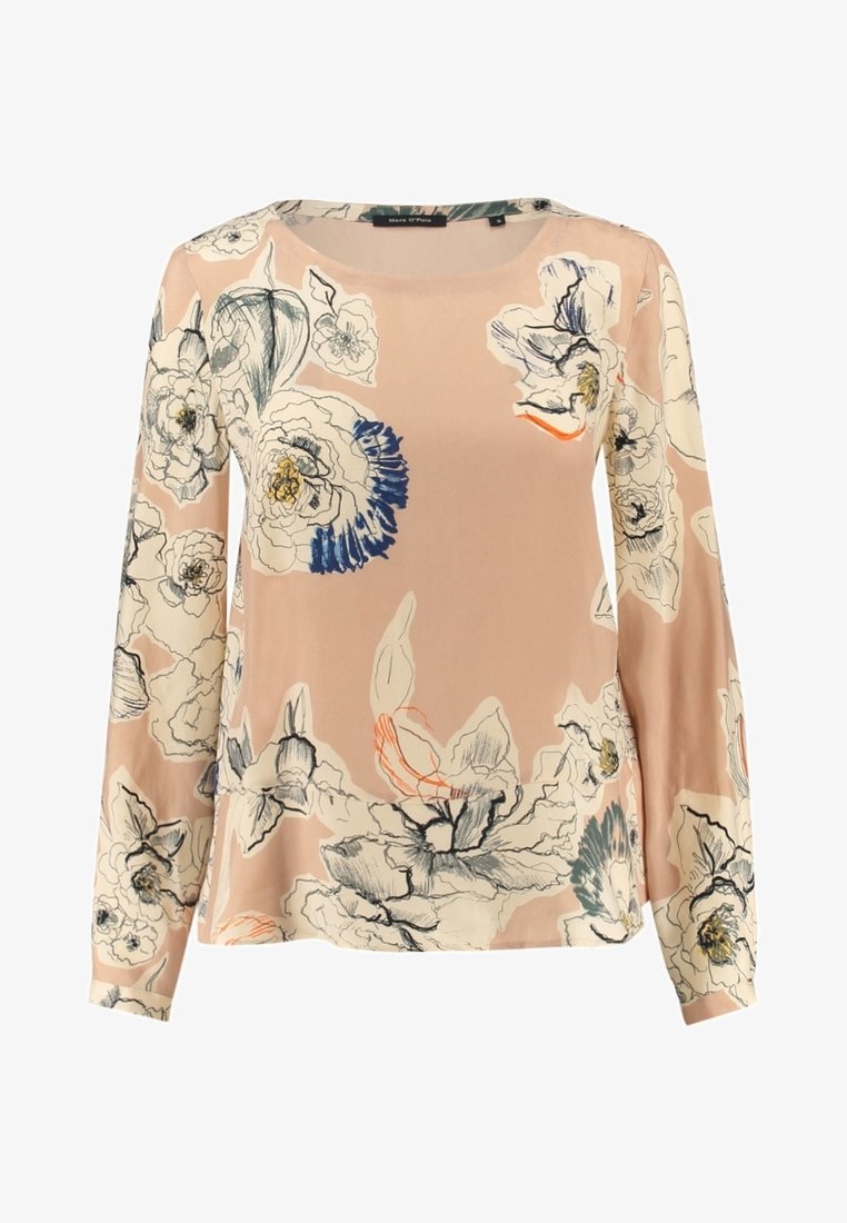 Blouse pêche à manches longues avec grands motifs floraux blancs et bleus et col rond.
