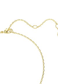 Bracciale in oro con catena a maglie allungate e chiusura a gancio. Presenta accentazioni ottagonali lungo la catena per un interesse visivo.