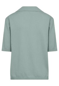 Vaaleanvihreä lyhythihainen poolopaita, valmistettu pehmeästä kankaasta, jossa on litteä kaulus ja resoriset hihansuut sekä suora helma.