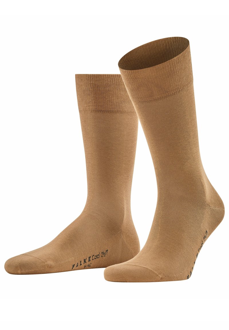 Beige Crew-Socken mit glatter Textur, geripptem Bund und verstärkten Zehen. Markenlogo seitlich aufgedruckt. Leicht und geeignet für warmes Wetter.