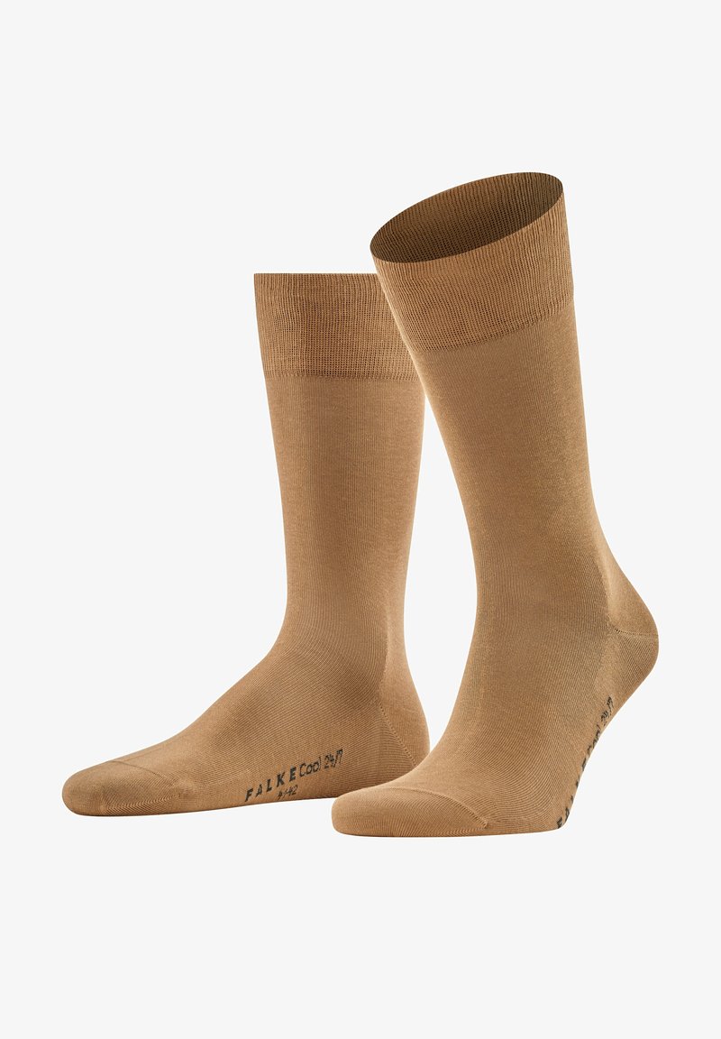 Beige Crew-Socken mit glatter Textur, geripptem Bund und verstärkten Zehen. Markenlogo seitlich aufgedruckt. Leicht und geeignet für warmes Wetter.