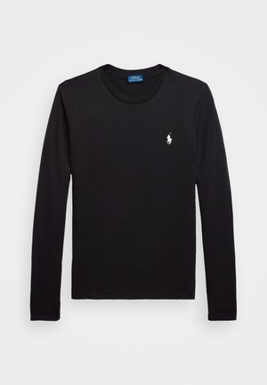 Camiseta negra de manga larga con cuello redondo y pequeño logo blanco de Polo Ralph Lauren en el pecho izquierdo, colocada plana sobre un fondo claro.
