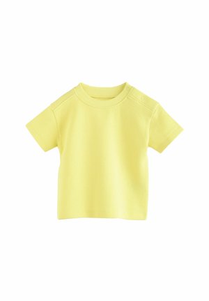 Gelbes T-Shirt mit kurzen Ärmeln aus strukturiertem Stoff. Verfügt über einen runden Ausschnitt mit Druckknöpfen an der Schulter. Einfaches und schlichtes Design.