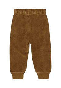 Bruine velours broek met een elastische tailleband en aansluitende cuffs. Zachte textuur met een gladde oppervlakte, ontworpen voor comfort en draaggemak.