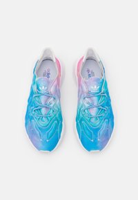 Blue to pink gradient sneakers featuring a textured upper, white laces, elastic gussets, and a cushioned sole. Adjustable fit.