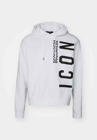 Sudadera blanca hecha de tejido suave, con un estampado de logo vertical en negro que incluye el texto "Dsquared2" y "ICON". Capucha con cordón y puños acanalados.