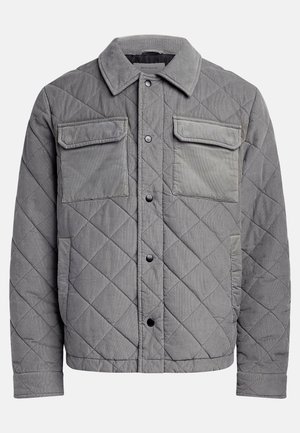 Quilted gray jacket made of textured fabric, featuring two chest pockets, snap buttons, and a point collar. Durable and insulated design.