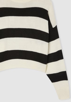 Maglione a righe bianche e nere in maglia con una vestibilità comoda. Presenta un ampio scollo e polsini a coste all'estremità delle maniche.