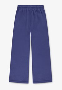 Námornícke modré široké nohavice s jemnou textúrou, s elastickým pásom a bez viditeľných zapínaní či vreciek.