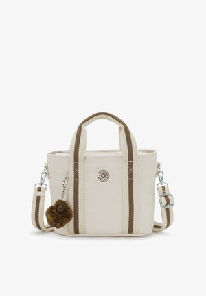 Borsa a tracolla in tela beige con manici a strisce marroni e tracolla regolabile, con una toppa rotonda del logo e un piccolo portachiavi a forma di scimmia marrone.