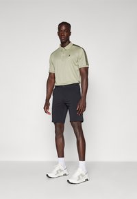 Peak Performance PLAYER - Pólóing - limit green/pine needle