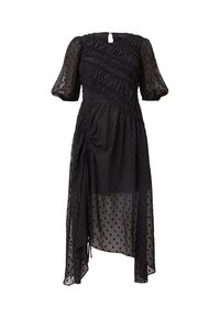 Vestido negro con tela transparente y texturizada que presenta detalles con volantes, mangas abullonadas y un dobladillo asimétrico. Cuerda deshecha en la cintura.