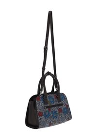 Sac à motif floral avec un corps en tissu gris, des accents en cuir foncé, des doubles poignées et une bandoulière amovible. Comprend une poche avant.