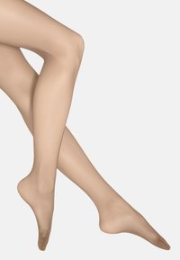 Beiga genomskinliga strumpbyxor med en slät yta, med en tight passform. Benen är något korsade, vilket visar en jämn färgfördelning.