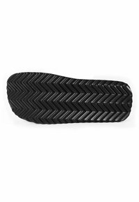 Schwarze Gummisohle mit einem Zickzack-Profil, mit einer glatten, abgerundeten Vorderseite und einer strukturierten Griffoberfläche für Traktion und Haltbarkeit.