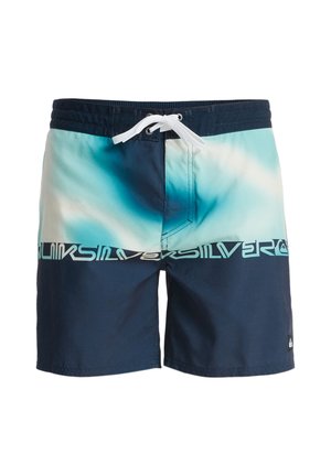 Maillots de bain pour hommes en polyester. Présentent un dégradé du bleu aqua au bleu marine, une taille élastique, un cordon de serrage blanc et le logo Quiksilver le long de l'ourlet.