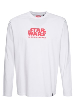 Bílý dlouhý rukáv tričko s kulatým výstřihem s červeným potiskem "STAR WARS" a "THE EMPIRE STRIKES BACK" na přední straně.