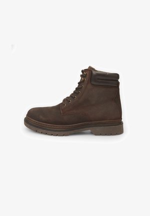 Stivaletto alla caviglia in suede marrone con accenti in pelle liscia, punta rotonda, chiusura con lacci, colletto imbottito e suola in gomma testurizzata con grip.