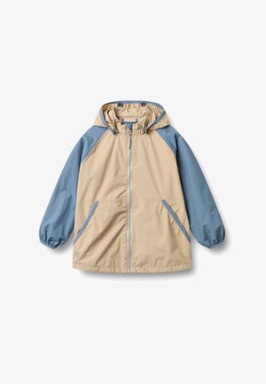 Béžová a modrá větrovka s kapucí, předním zipem a dvěma šikmými kapsami, elastickými manžetami a raglánovými rukávy v blokových barvách.