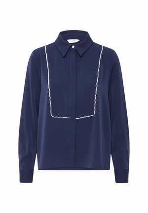 Sötétkék, hosszú ujjú ing klasszikus gallérral, fehér hímzett díszítéssel az elülső panelen és gombos záródással.