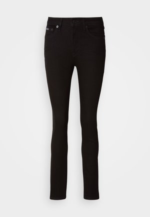 Sorte denimjeans med en smal passform. Har knappelukking, tradisjonell femlommersdesign og subtile sømdetaljer.