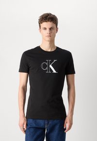 Calvin Klein Jeans OUTLINE MONOLOGO TEE - T-shirts print - black