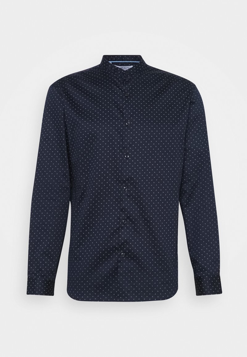 Marineblaues Langarmhemd mit Stehkragen, verziert mit einem kleinen weißen Dreiecksmuster und einer Vorderknopfleiste. Glatter, strukturierter Stoff.