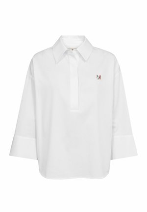 Hvid langærmet poloshirt med brede manchetter, en spids krave, skjult knaplukning og et lille farverigt "M" logo på venstre bryst.