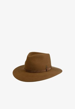 Brown felt fedora hat with a wide brim and a suede band featuring a small metal emblem on the side.