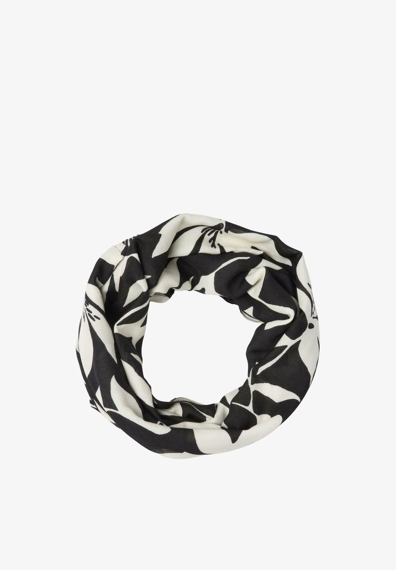 Écharpe infinie noire et blanche avec un motif floral audacieux, disposée en boucle circulaire sur un fond blanc.