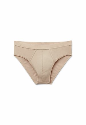 Beige bomuldsboksershorts med et sømløst design, elastisk talje, og en foret front for komfort. Ingen synlige mønstre eller hardware detaljer.