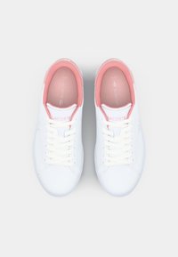 White sneakers with pink accents, featuring a smooth leather upper, round toe, lace-up closure, and branded insoles.