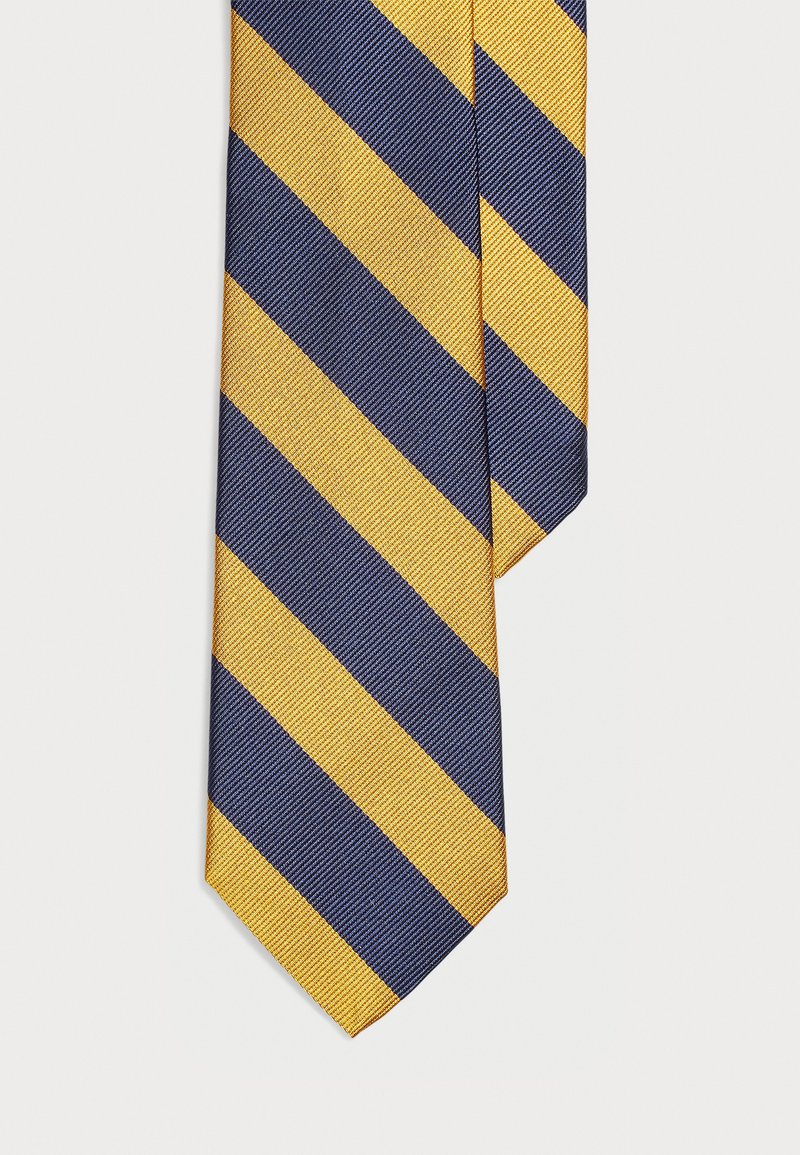 Modra in rumena striped kravata z diagonalnimi vzorci, ki se ponaša z teksturirano tkanino in konico v obliki puščice. Oblikovanje poudarja kontrastne barve.
