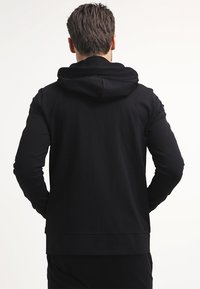 Filippa K Sudadera con cremallera - black