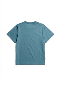 Korte mouwen T-shirt in teal katoen met een klassieke ronde hals en een ontspannen pasvorm, voorzien van een klein merklabel op de lagere zijschoen.